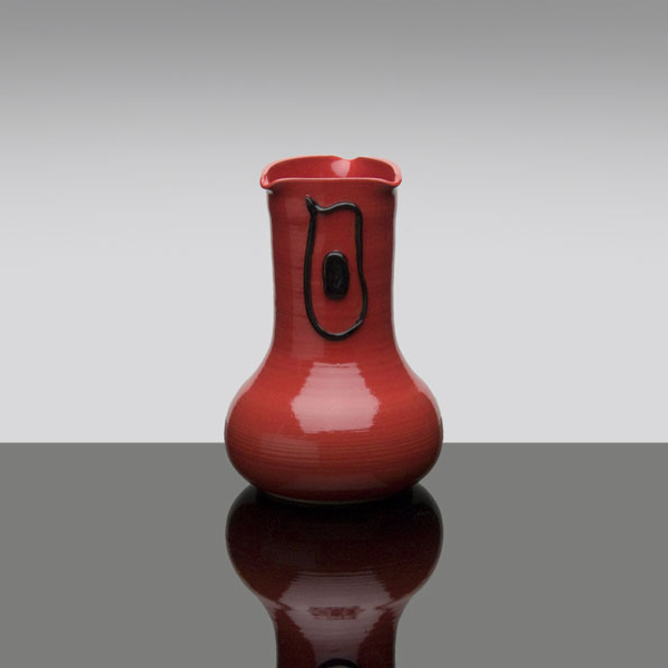 red vase with black decoration