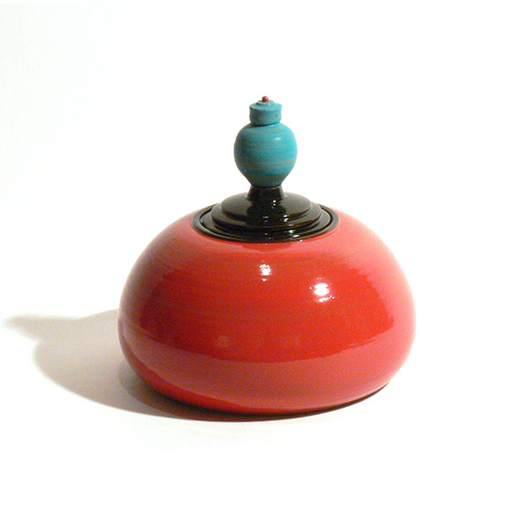 squat red covered jar