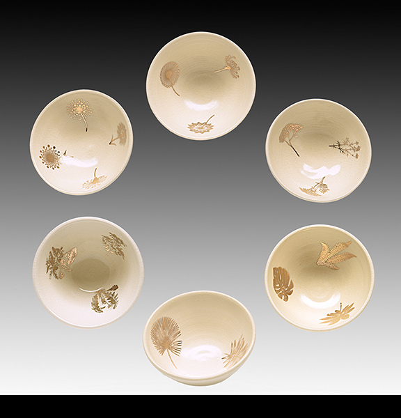 6 dishes with gold decals